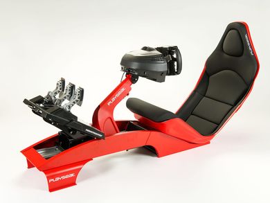 The gaming chair consists of a red plastic seat and has an elongated, low shape. The seat cushions are covered with black imitation leather. The seat is mounted on a red wave-shaped metal frame that extends far beyond the seat at the front. The frame thus allows the feet to rest on a metal plate on which the gas, brake and clutch pedals are mounted. A column on which a steering wheel is mounted rises up from the frame just in front of the driver's seat.