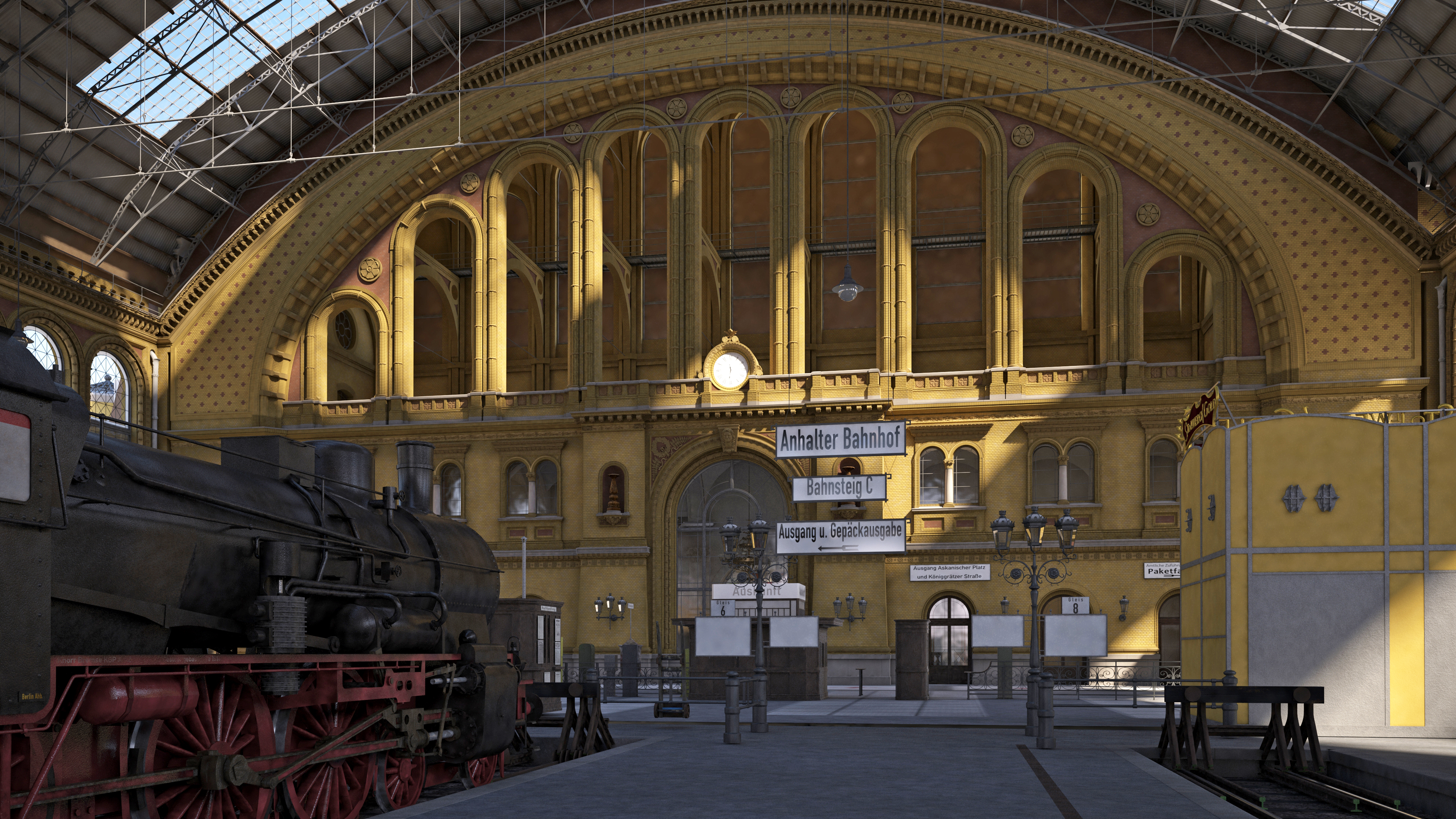 Blick vom mittleren Bahnsteig in Richtung des Querbahnsteigs.  Der große Bogen der Dachkonstruktion überspannt die Halle. Auf der linken Seite steht eine historische Dampflok.