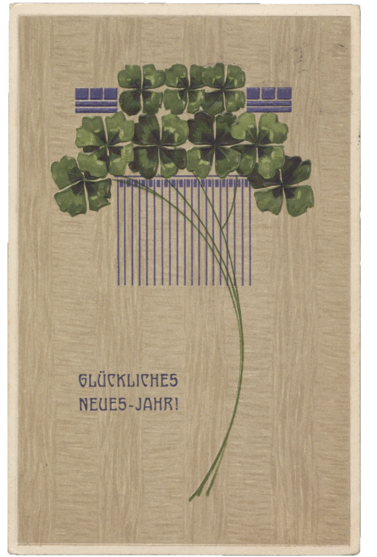 Foto einer Postkarte mit dem Schriftzug „Glückliches Neues-Jahr!“ und einem Strauß von vierblättrigen Kleeblättern.