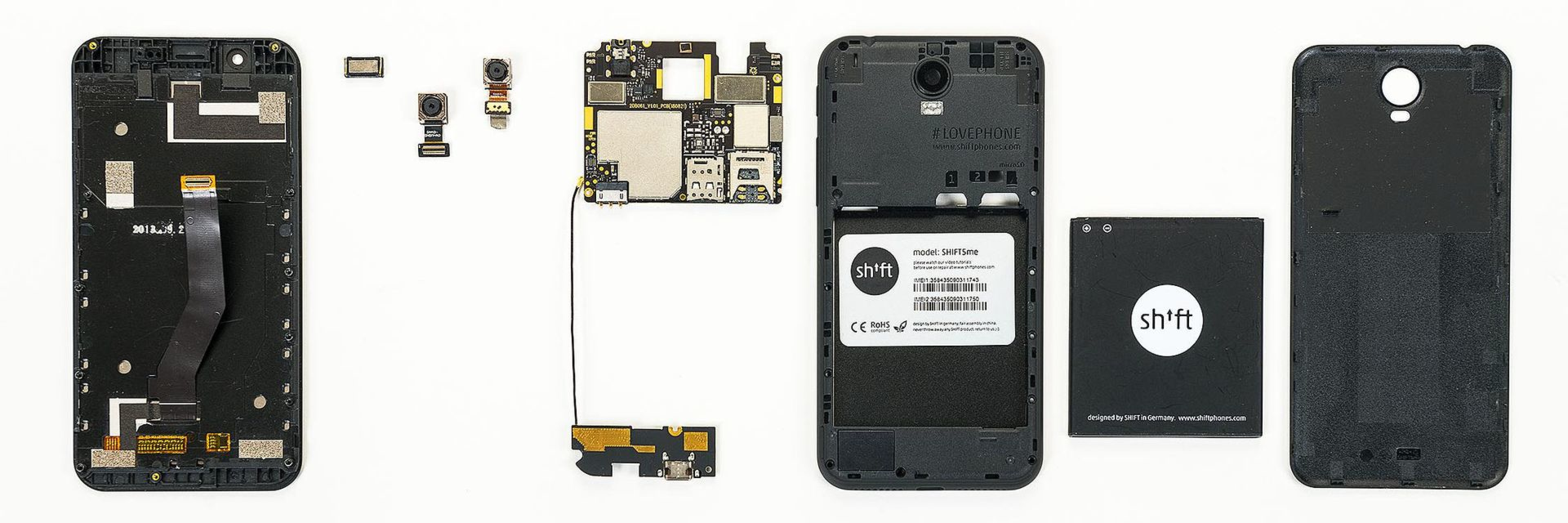 A smartphone has been taken apart into its individual components: the case, battery, display, camera, sensors, and various modular parts of the smartphone are lined up side by side.